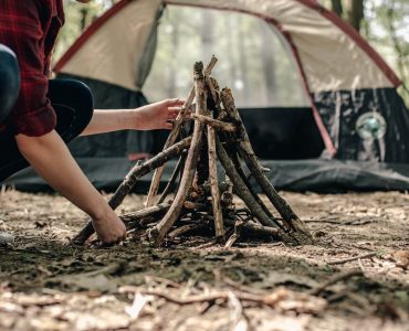 Photo - Building a Fire In Front of a Tent