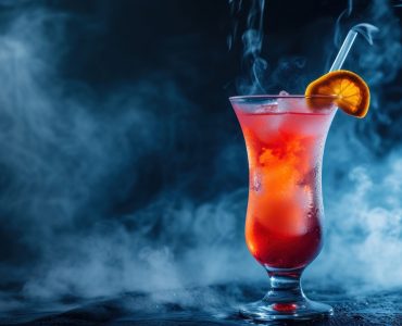 close-up *cocktail*, on a dark background in water mist and steam, photography in the studio. --ar 3:2 --v 6.0