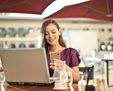 Photo - Female Entrepreneur with Phone & Laptop
