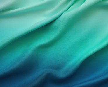 top view photo of a *gradient* color fabric texture, background, cotton texture, green and blue color, flat lay --ar 3:2 --v 5.2