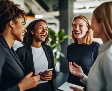 Business people are smiling and chatting laughing diverse person.