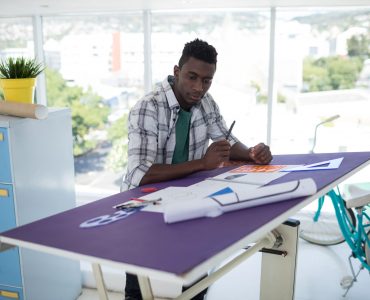 Photo - Man Reviewing Plan