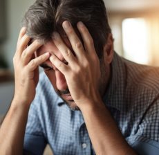 Stressed man fat head worried person.