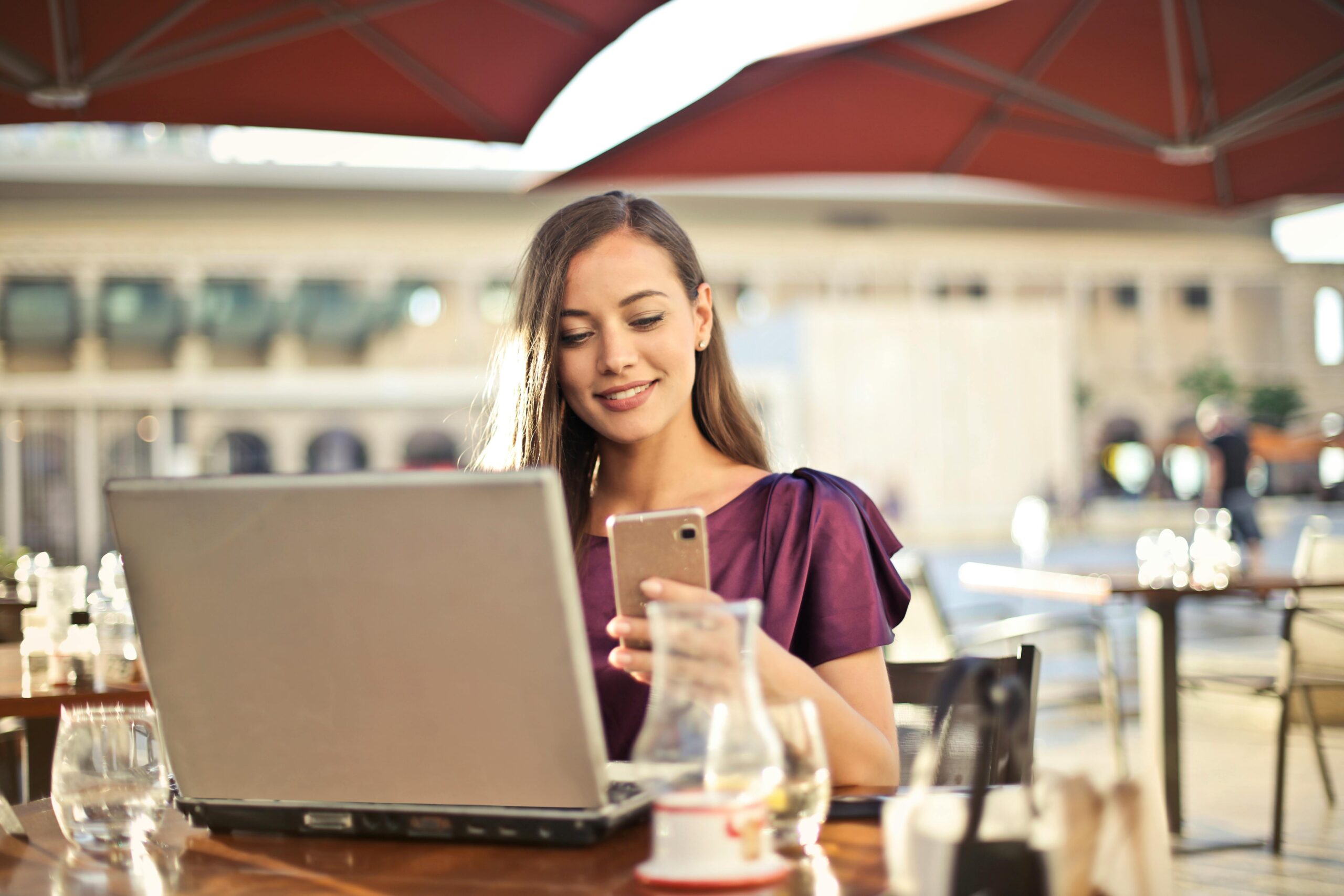 Photo - Female Entrepreneur with Phone & Laptop
