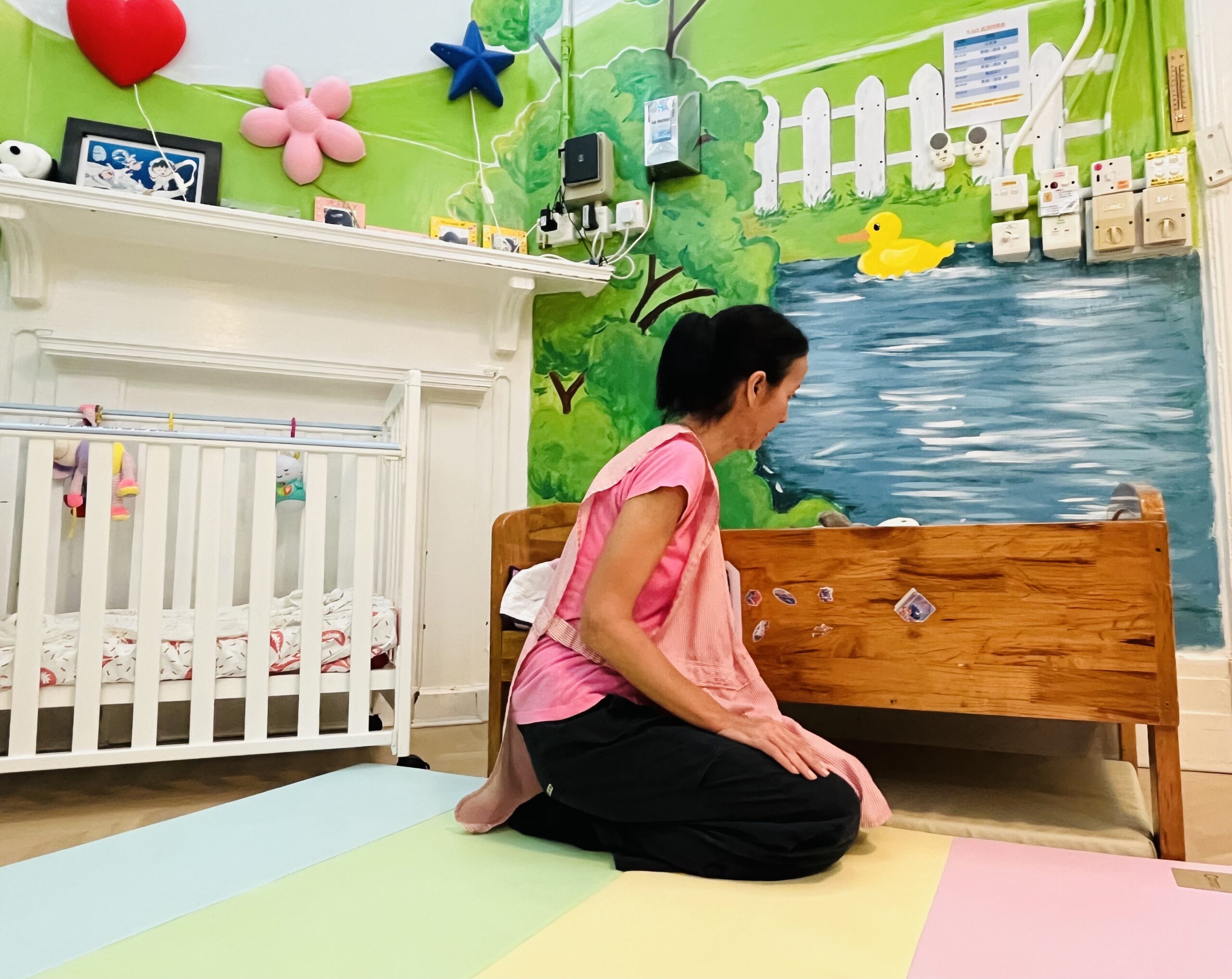 Patting a child to sleep.