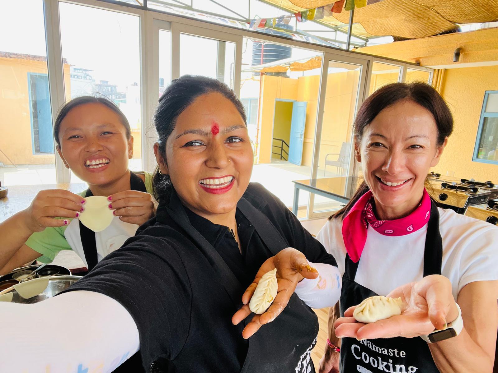 Learning to make traditional Nepalese ‘momos’ with the women of the Namaste Cooking School.