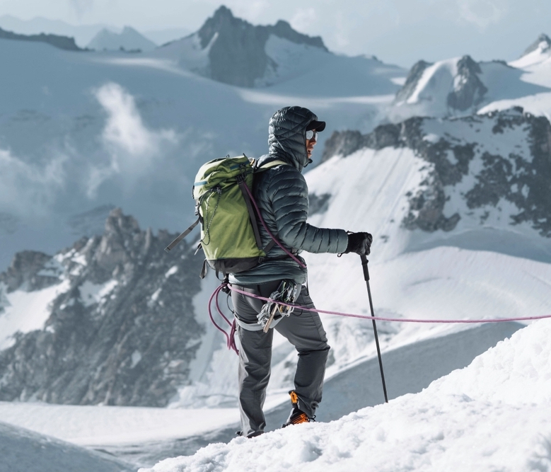 Hiker going up Chamonix Alps in France